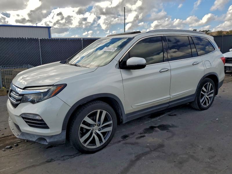 Photo 1 from auction – 2016 HONDA PILOT TOUR with VIN 5FNYF5H97GB022798