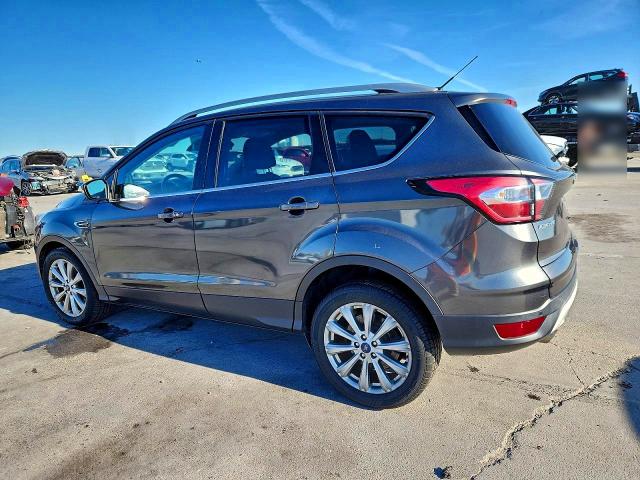 Photo 2 from auction – 2017 FORD ESCAPE TIT with VIN 1FMCU0JD2HUC72617