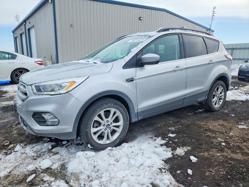 FORD ESCAPE 2018 with VIN 1FMCU9HD8JUB74787 - Photo from auction