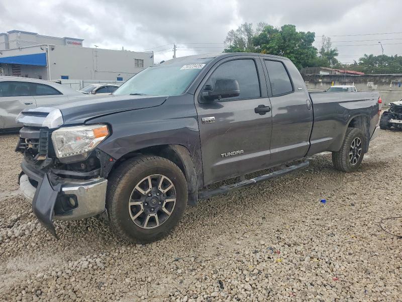 TOYOTA TUNDRA DOU 2014 with VIN 5TFTY5F14EX008345 - Photo from auction