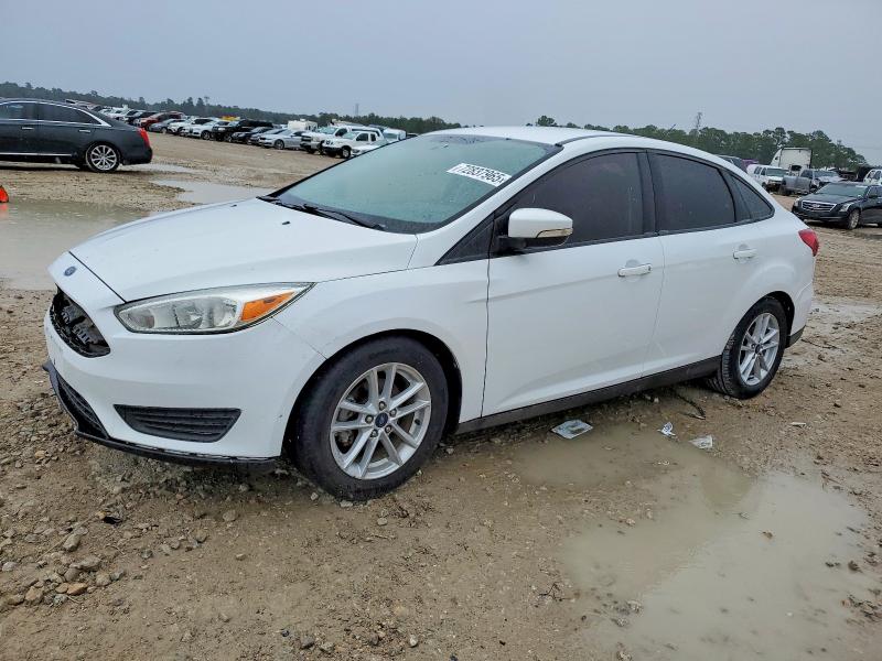 FORD FOCUS SE 2017 with VIN 1FADP3F29HL285465 - Photo from auction