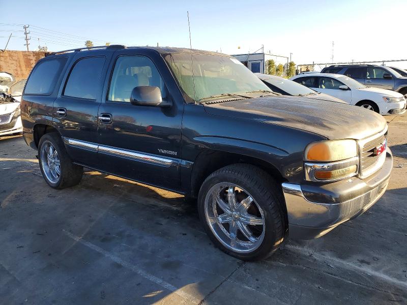 Photo 4 from auction – 2003 GMC YUKON with VIN 1GKEC13T63J331807