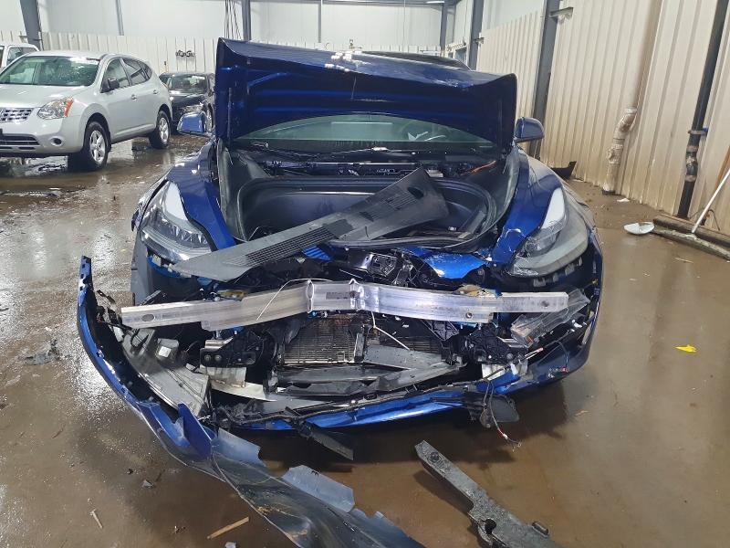 Photo 5 from auction – 2021 TESLA MODEL 3 with VIN 5YJ3E1EA4MF051773