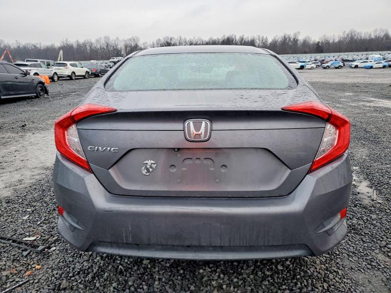 Photo 6 from auction – 2016 HONDA CIVIC LX with VIN 2HGFC2F52GH526556