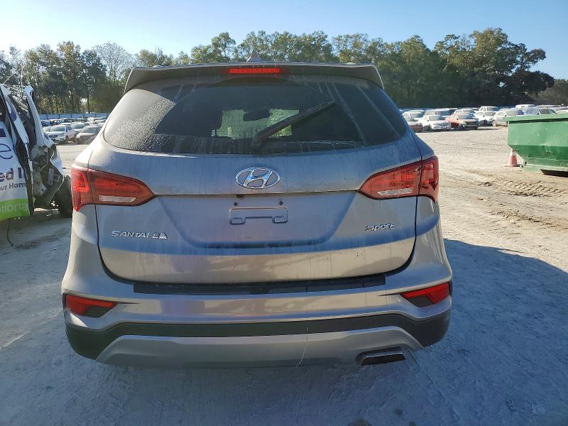 Photo 6 from auction – 2018 HYUNDAI SANTA FE S with VIN 5NMZU3LB8JH077520