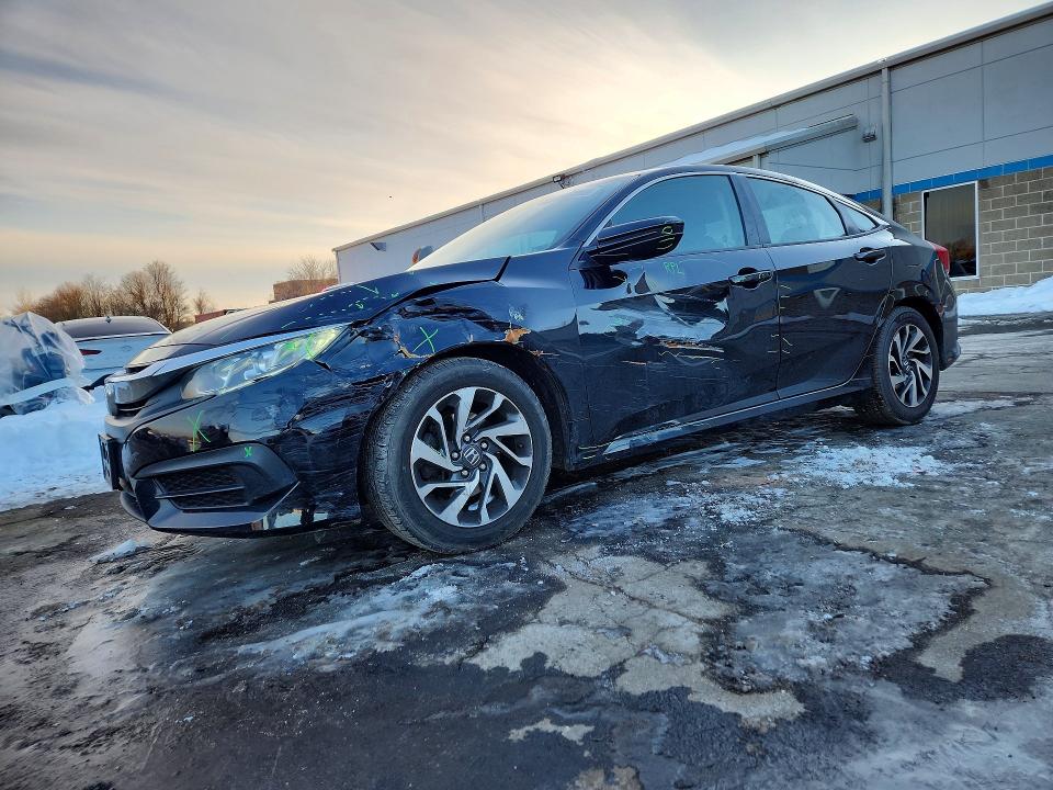 HONDA CIVIC 2016 with VIN 2HGFC2F74GH527418 - Photo from auction
