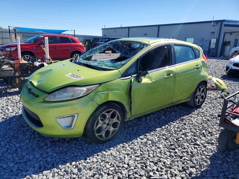 FORD FIESTA SES 2012 with VIN 3FADP4FJ2CM106980 - Photo from auction