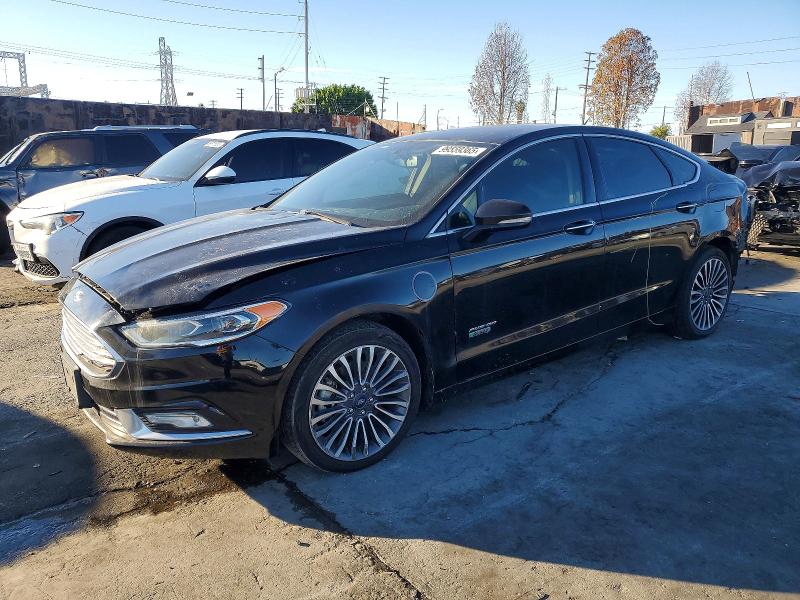 FORD FUSION TIT 2018 with VIN 3FA6P0SU7JR180946 - Photo from auction