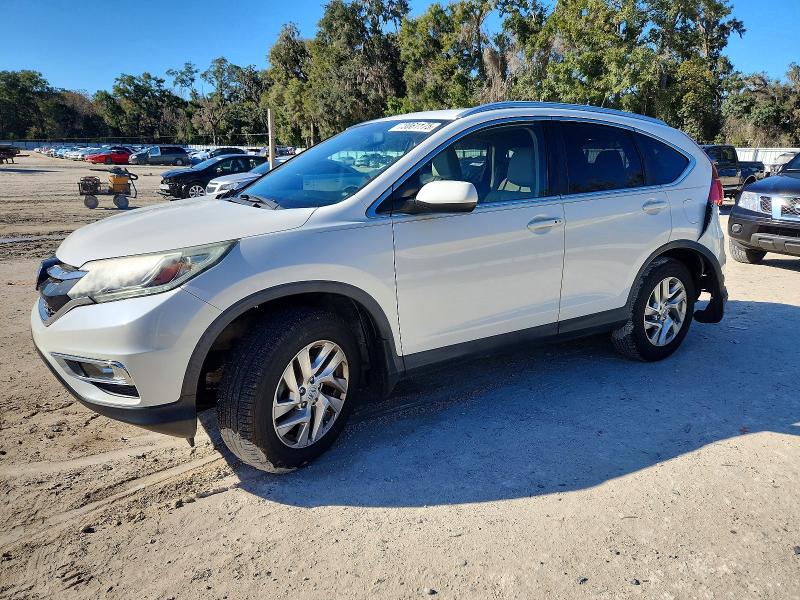 Photo 1 from auction – 2015 HONDA CR-V with VIN 5J6RM3H75FL023886