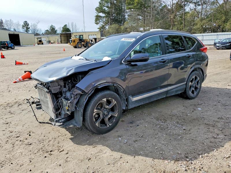 HONDA CR-V TOURI 2018 with VIN 7FARW2H94JE061038 - Photo from auction