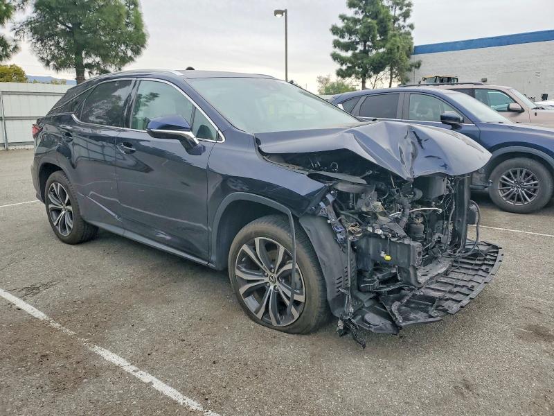 Photo 4 from auction – 2021 LEXUS RX with VIN 2T2HZMAA5MC210866
