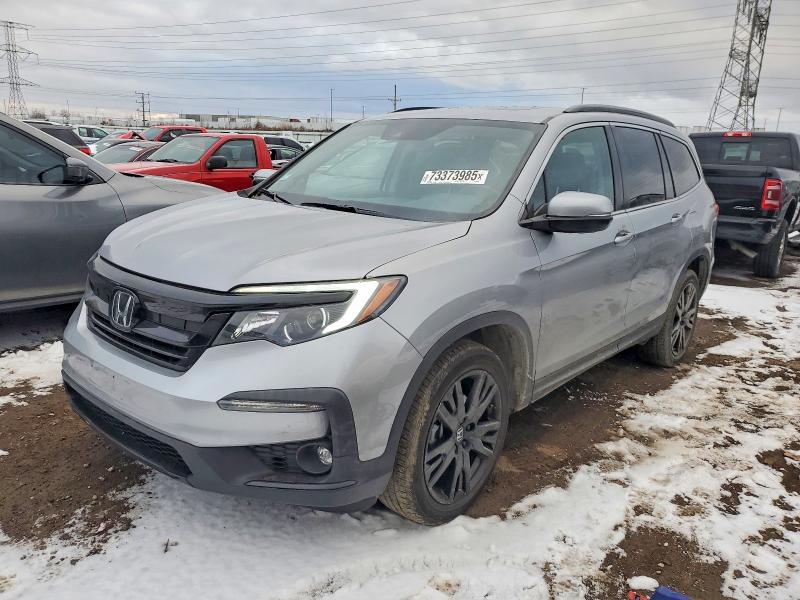 HONDA PILOT 2022 with VIN 5FNYF6H26NB101398 - Photo from auction