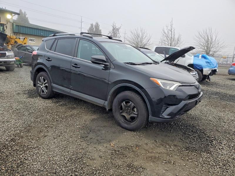 Photo 4 from auction – 2018 TOYOTA RAV4 LE with VIN 2T3BFREV7JW808942