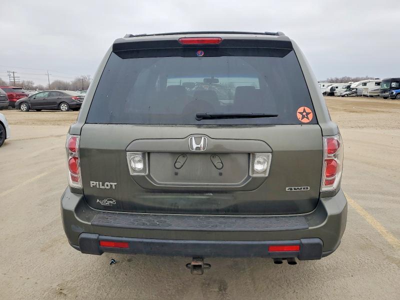 Photo 6 from auction – 2006 HONDA PILOT EX with VIN 5FNYF18496B026122