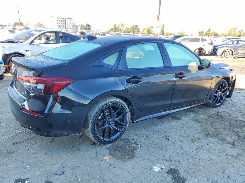 Photo 3 from auction – 2025 HONDA CIVIC SPOR with VIN 2HGFE4F82SH306911
