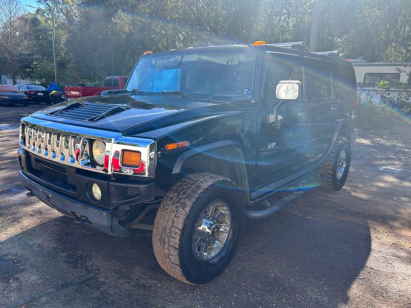 Photo 2 from auction – 2004 HUMMER H2 with VIN 5GRGN23U14H102259