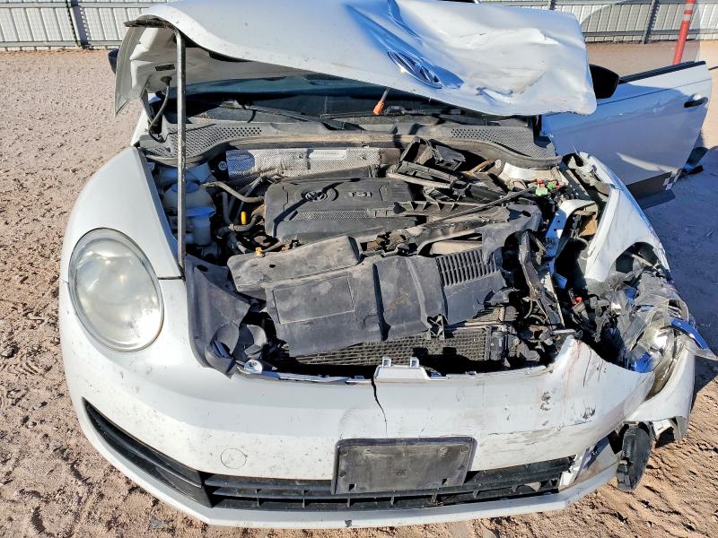 Photo 11 from auction – 2014 VOLKSWAGEN BEETLE with VIN 3VWF17AT1EM646528