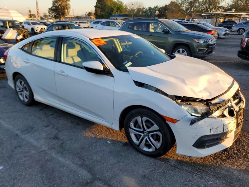 Photo 4 from auction – 2017 HONDA CIVIC LX with VIN 2HGFC2F57HH559652