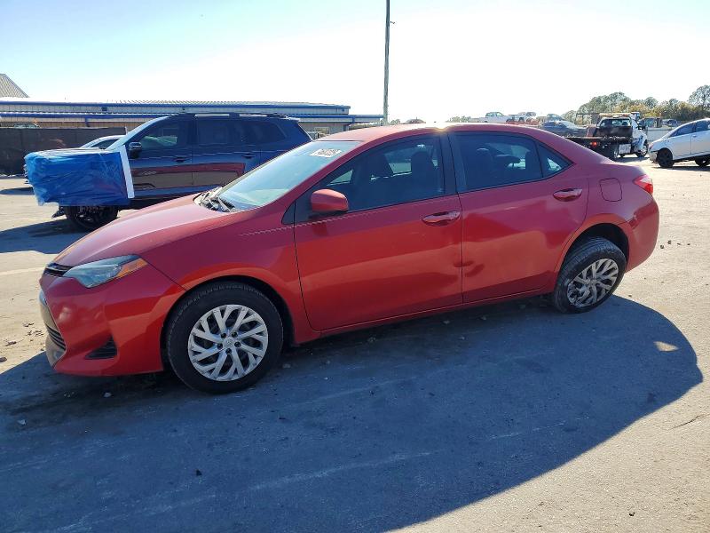 TOYOTA COROLLA 2018 with VIN 5YFBURHE6JP757882 - Photo from auction