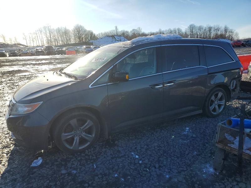 HONDA ODYSSEY 2012 with VIN 5FNRL5H9XCB116861 - Photo from auction