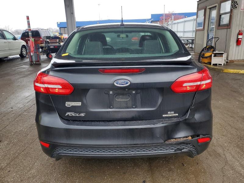 Photo 6 from auction – 2015 FORD FOCUS SE with VIN 1FADP3F21FL286915