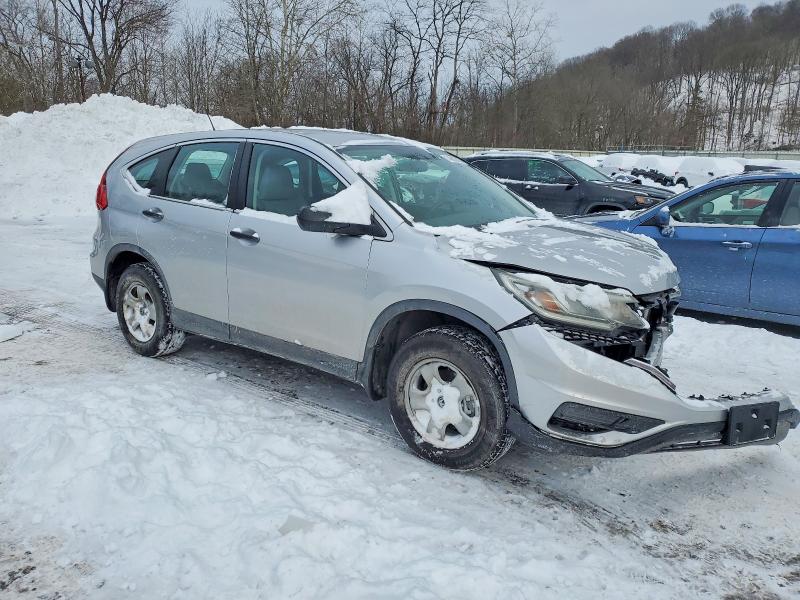 Photo 4 from auction – 2015 HONDA CR-V LX with VIN 5J6RM4H34FL082544