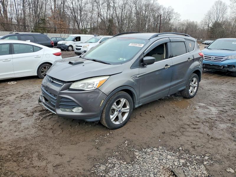 FORD ESCAPE SE 2014 with VIN 1FMCU9G95EUE28877 - Photo from auction