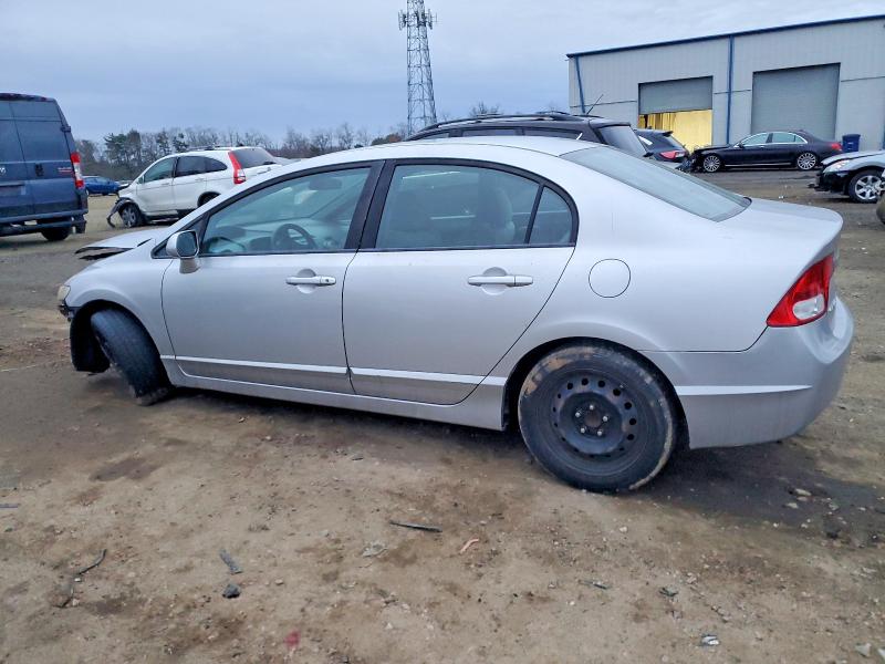 Photo 2 from auction – 2011 HONDA CIVIC LX with VIN 19XFA1F50BE042565