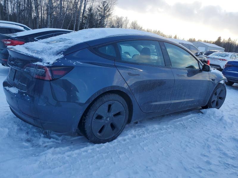 Photo 3 from auction – 2022 TESLA MODEL 3 with VIN 5YJ3E1EB2NF323439