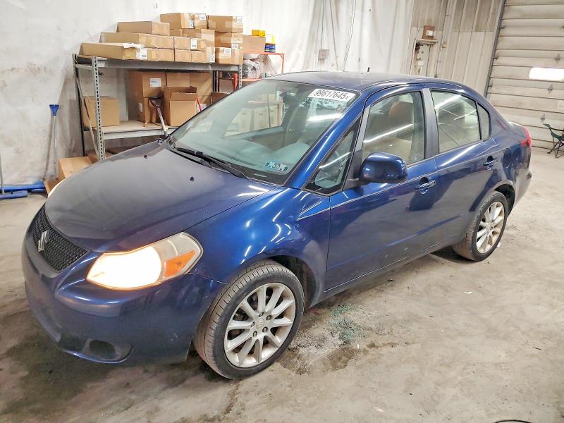 SUZUKI SX4 LE 2011 with VIN JS2YC5A22B6301737 - Photo from auction