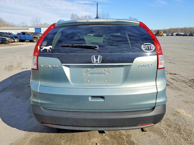 Photo 6 from auction – 2012 HONDA CR-V EXL with VIN 2HKRM4H77CH631162