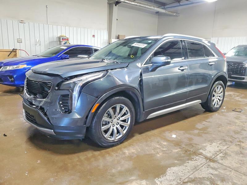 CADILLAC XT4 PREMIU 2021 with VIN 1GYFZCR40MF034928 - Photo from auction