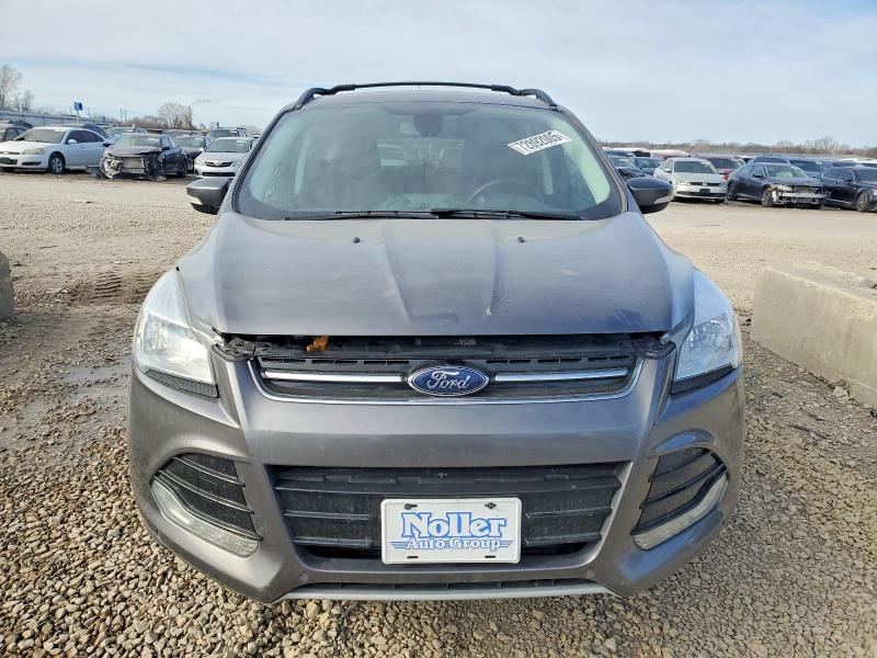 Photo 5 from auction – 2013 FORD ESCAPE with VIN 1FMCU9H95DUB55064