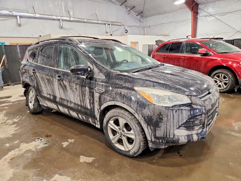 Photo 4 from auction – 2016 FORD ESCAPE with VIN 1FMCU9GX0GUA34625
