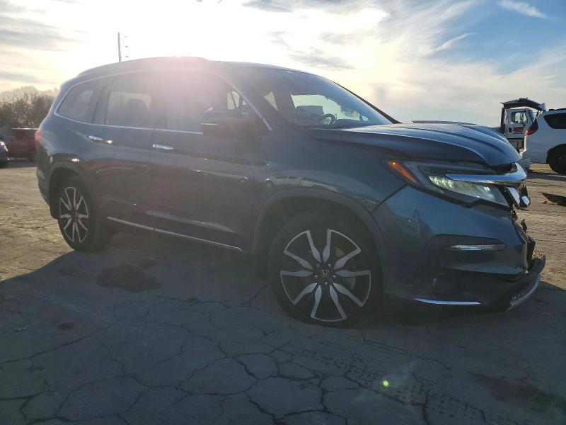 Photo 4 from auction – 2021 HONDA PILOT TOUR with VIN 5FNYF5H98MB016665