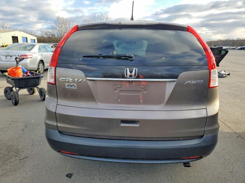 Photo 6 from auction – 2013 HONDA CR-V with VIN 5J6RM4H51DL088901