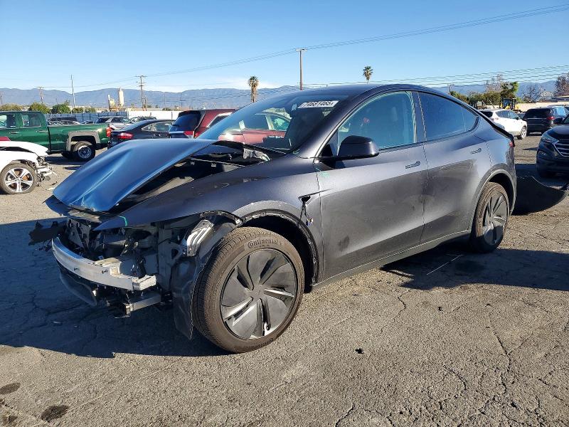 TESLA MODEL Y 2026 with VIN 7SAYGDED2TF387127 - Photo from auction