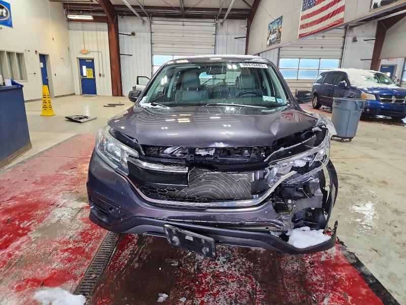 Photo 5 from auction – 2015 HONDA CR-V LX with VIN 5J6RM4H36FL028002