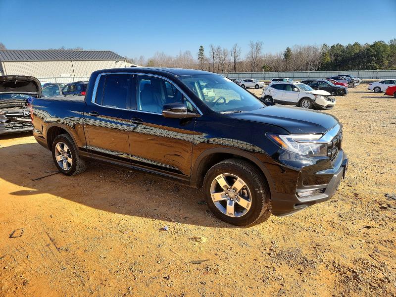Photo 4 from auction – 2025 HONDA RIDGELINE with VIN 5FPYK3F58SB013432