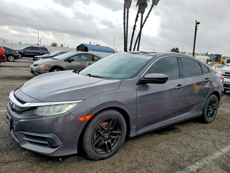 HONDA CIVIC LX 2017 with VIN 2HGFC2F5XHH528346 - Photo from auction
