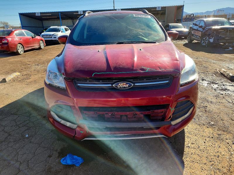 Photo 5 from auction – 2016 FORD ESCAPE with VIN 1FMCU9GX4GUA98487
