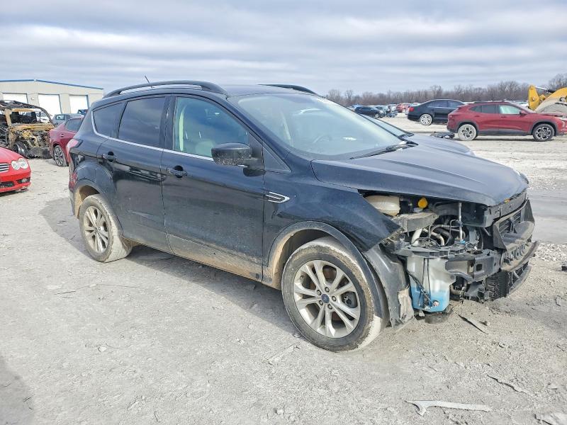 Photo 4 from auction – 2018 FORD ESCAPE SE with VIN 1FMCU9GD9JUB09769