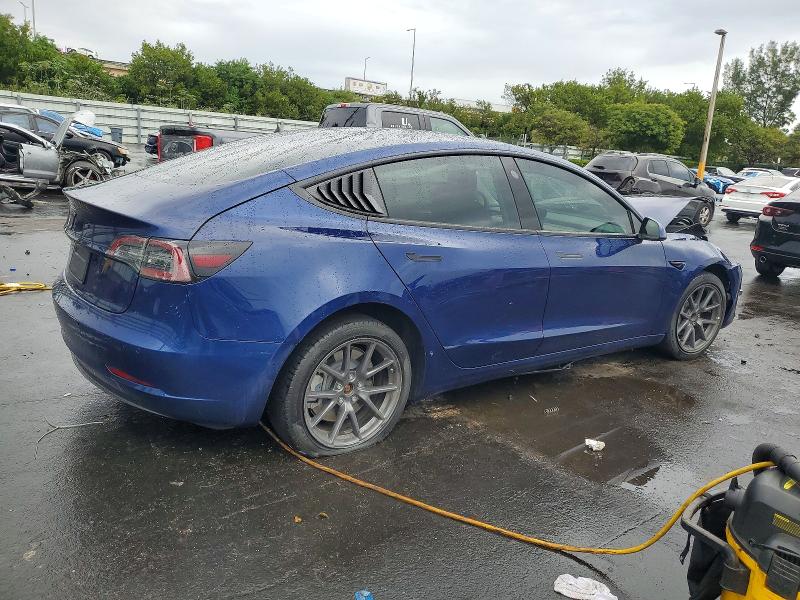 Photo 3 from auction – 2022 TESLA MODEL 3 with VIN 5YJ3E1EAXNF341792
