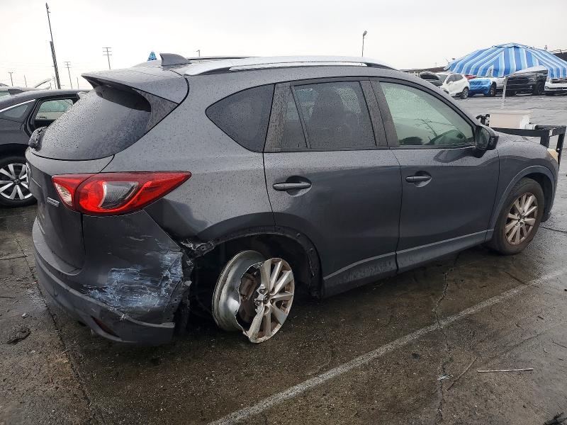 Photo 3 from auction – 2014 MAZDA CX-5 with VIN JM3KE2CY3E0328048