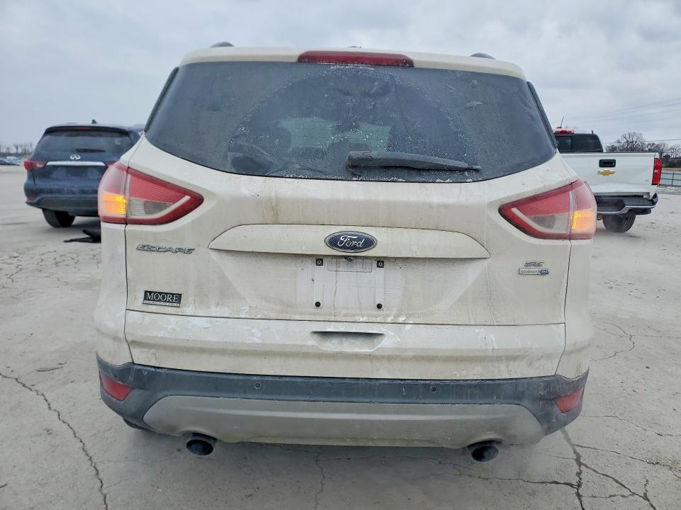 Photo 6 from auction – 2016 FORD ESCAPE with VIN 1FMCU9G90GUC54851