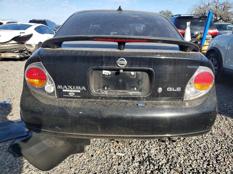 Photo 6 from auction – 2002 NISSAN MAXIMA GLE with VIN JN1DA31A02T302156
