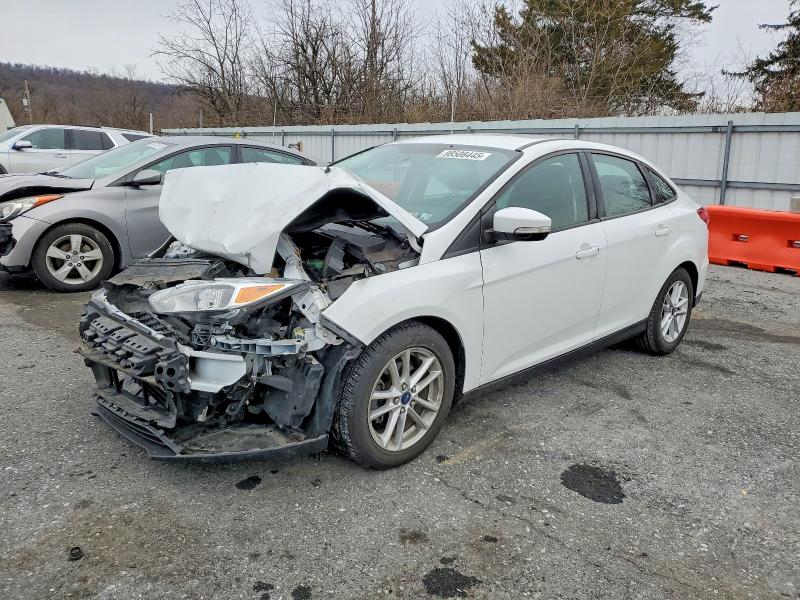 FORD FOCUS SE 2015 with VIN 1FADP3F20FL206889 - Photo from auction