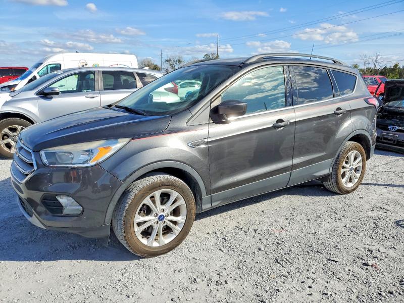 FORD ESCAPE SE 2018 with VIN 1FMCU0GD3JUC67259 - Photo from auction