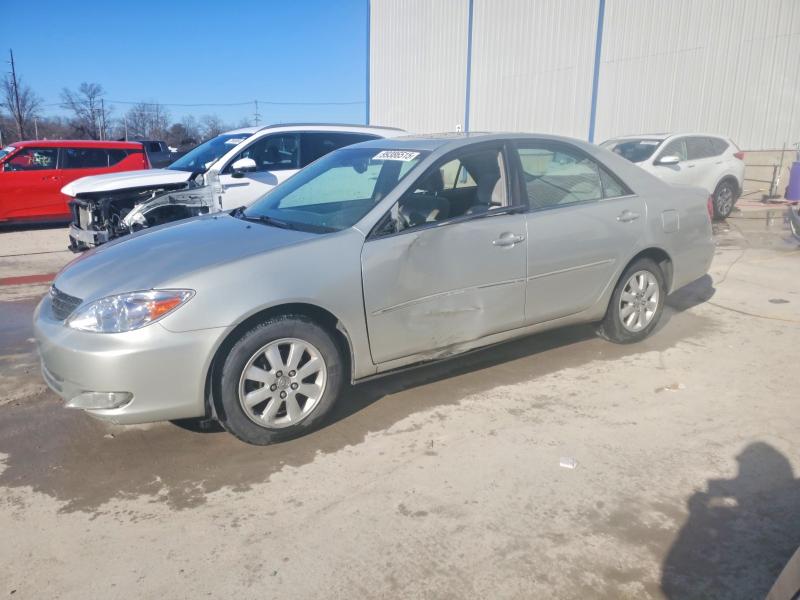 TOYOTA CAMRY LE 2003 with VIN 4T1BF32KX3U551410 - Photo from auction