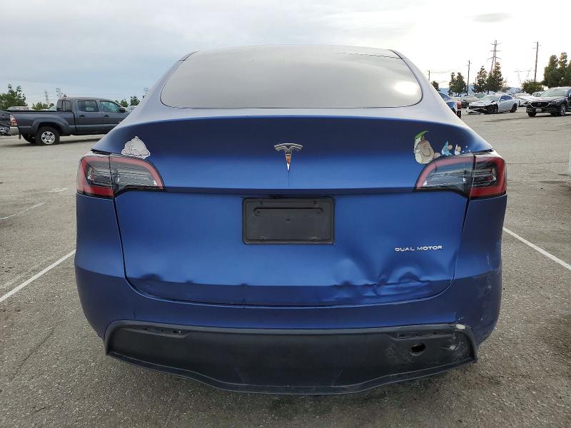 Photo 6 from auction – 2023 TESLA MODEL Y with VIN 7SAYGDEE7PF899660